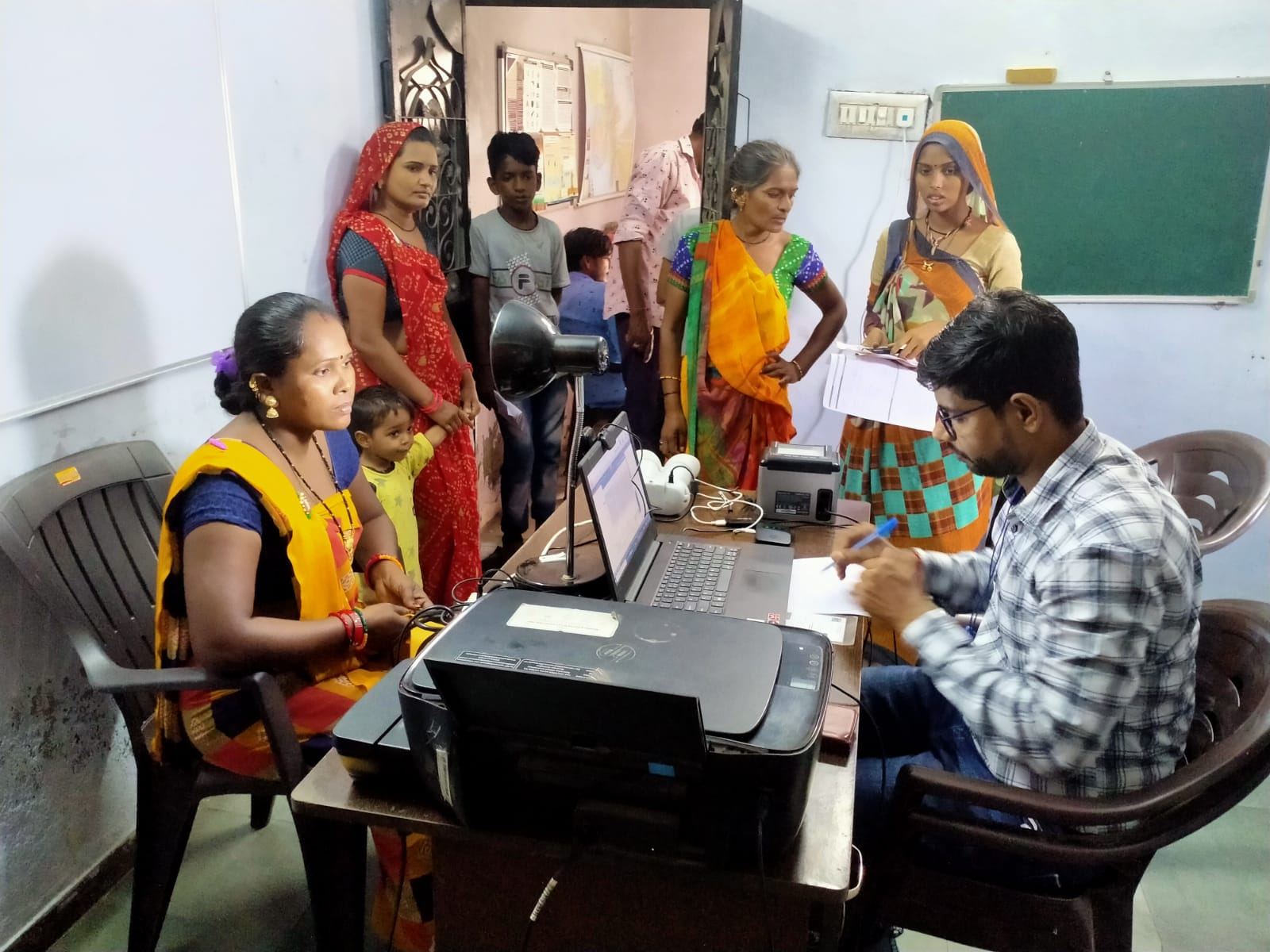 Families at an entitlement facilitation desk
