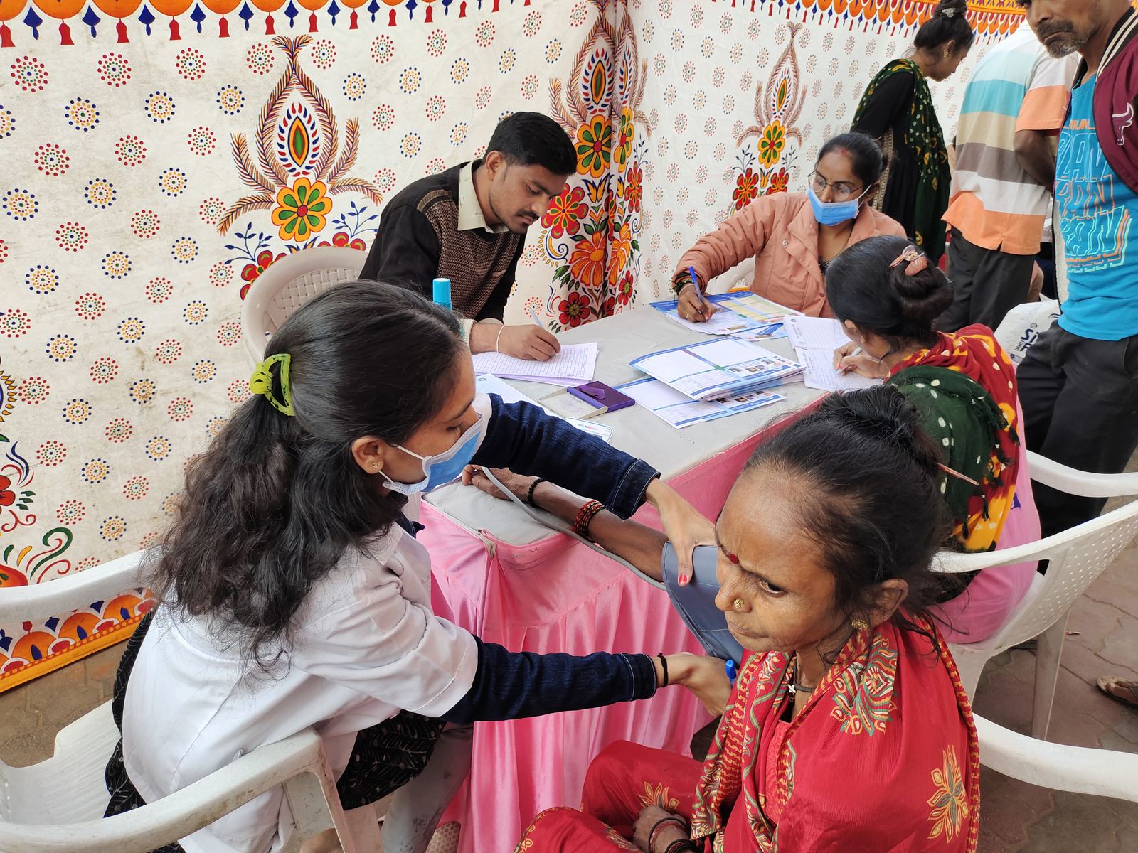 A health check-up at a community camp